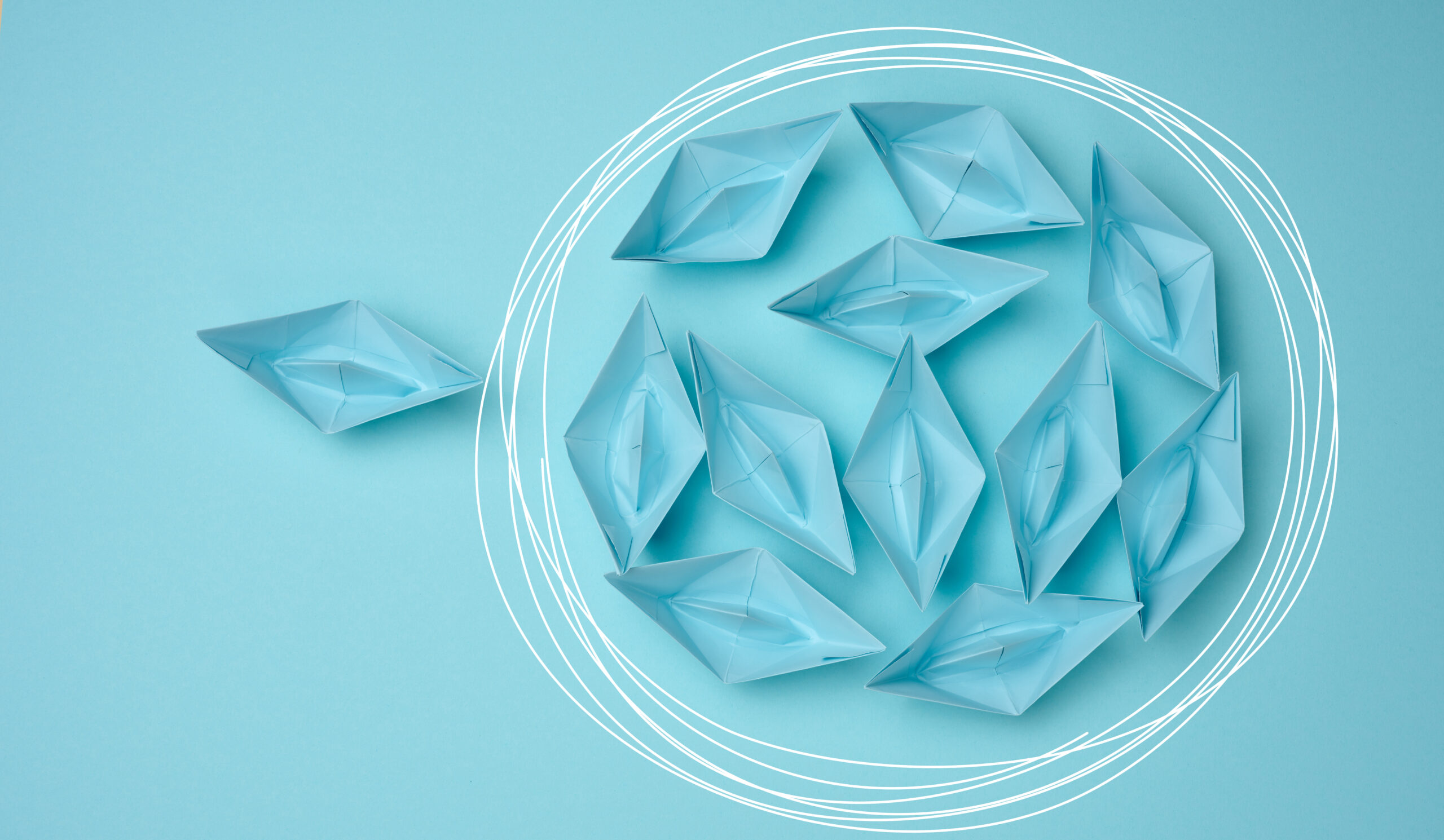 group of paper boats floats in a circle, another red floats in a straight line. Strong leader concept, different vision, strong business. Looping over an idea